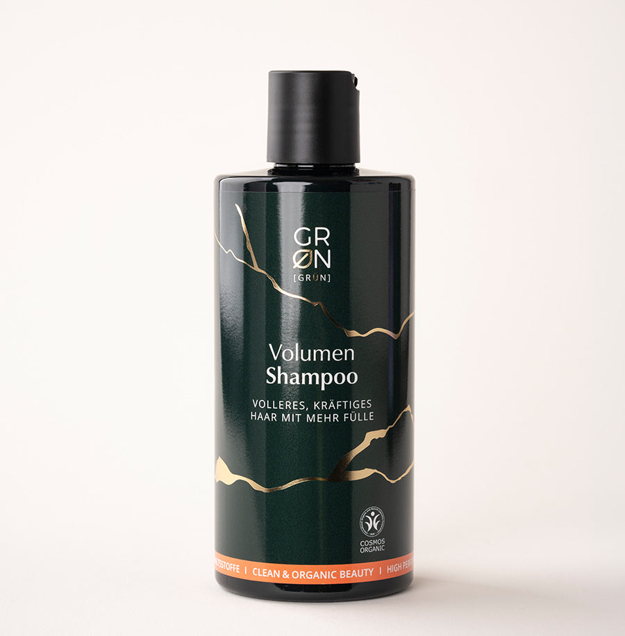 Flasche des Shampoo Volumen mit Rotalge und L-Arginin; stärkt feines Haar, beugt Haarbruch und Spliss vor und sorgt für geschmeidige, kräftige Haare