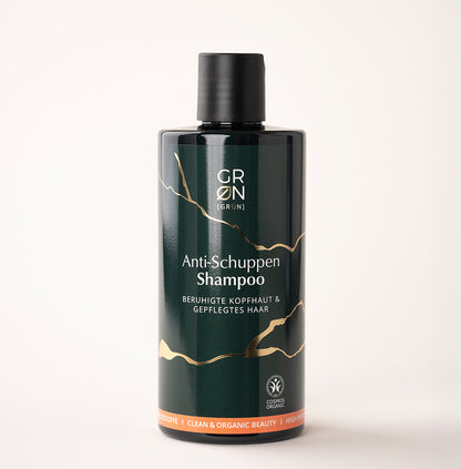 Flasche des Shampoo Anti-Schuppen mit Apfelessig und Shikimisäure aus Sternanis; reguliert das Haar, beruhigt die Kopfhaut und sorgt für geschmeidiges, ausgeglichenes Haar